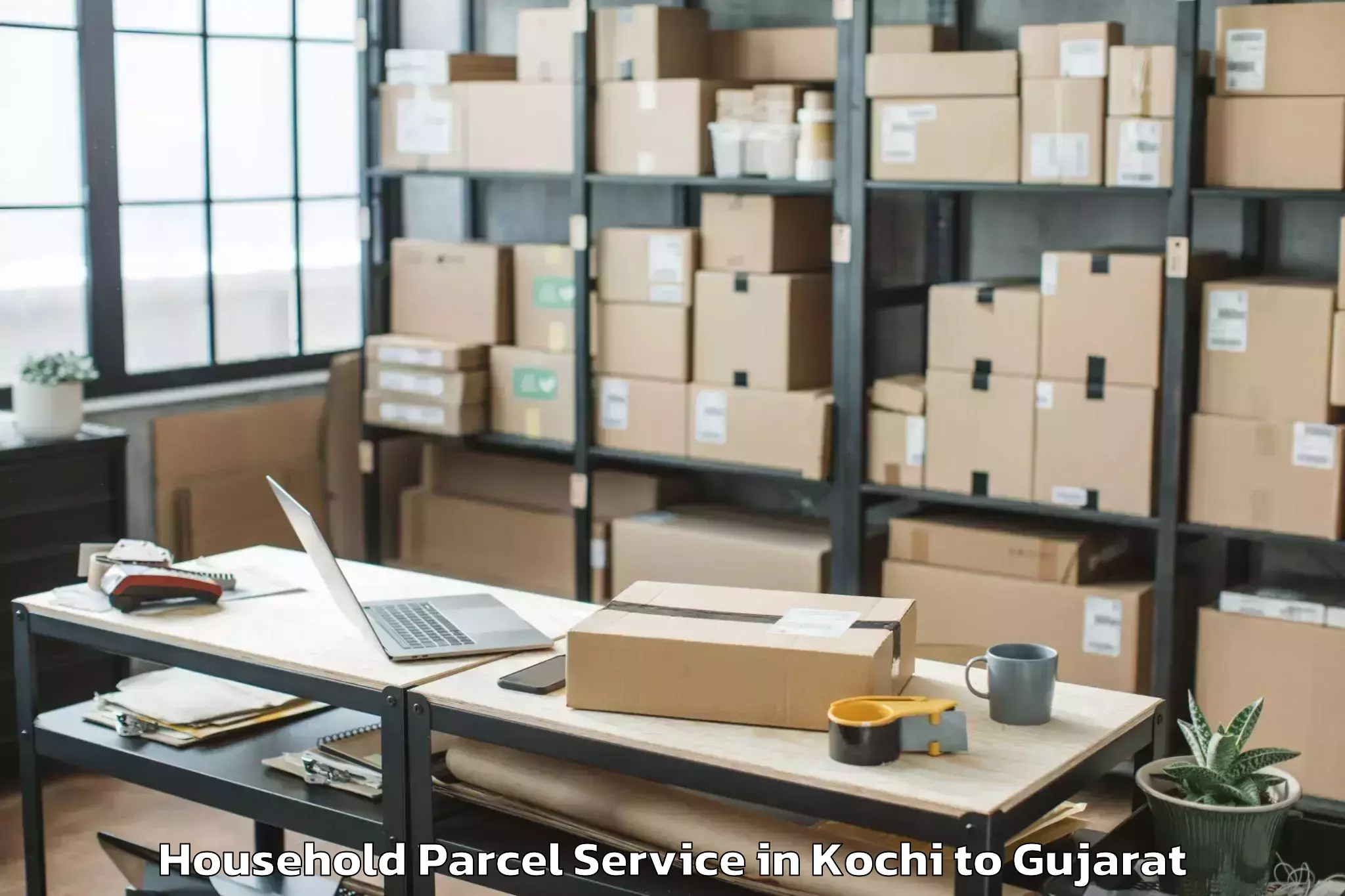 Book Kochi to Jhagadia Household Parcel Online